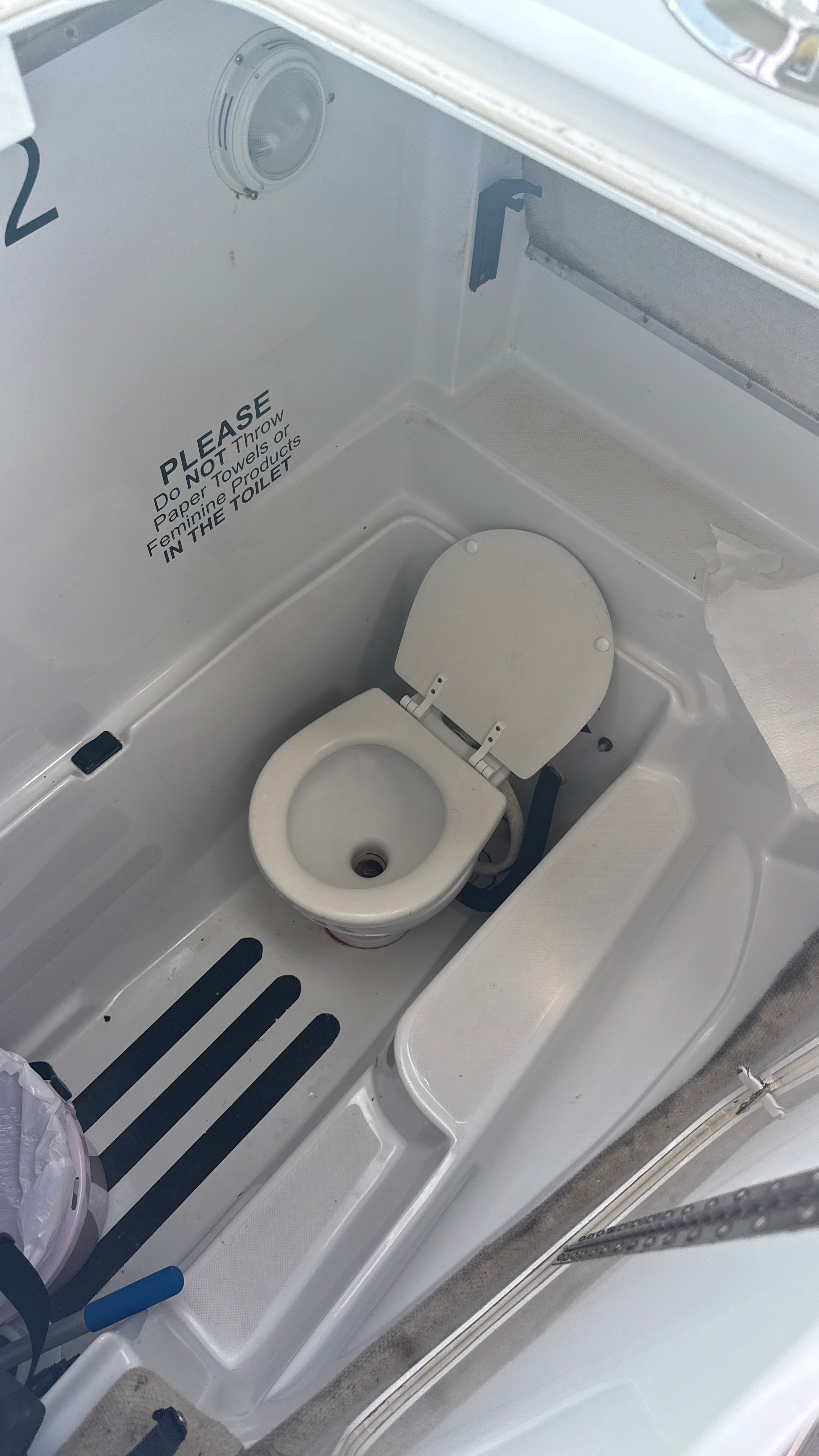 Restroom with toilet on boat 